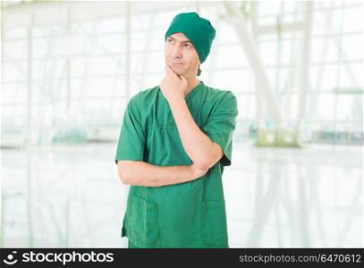 male doctor thinking at the hospital. doctor thinking