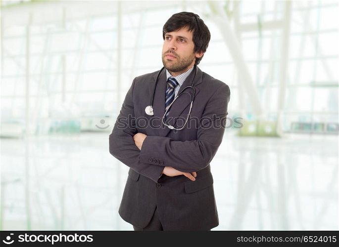 male doctor thinking, at the hospital. doctor thinking