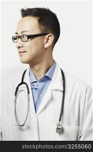 Male doctor with a stethoscope around his neck