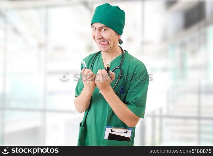 male doctor with a syringe at the hospital