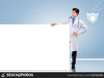 Male doctor with banner