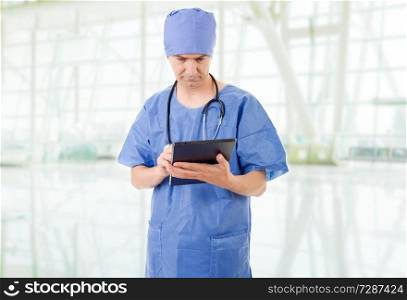 male doctor with tablet at the hospital