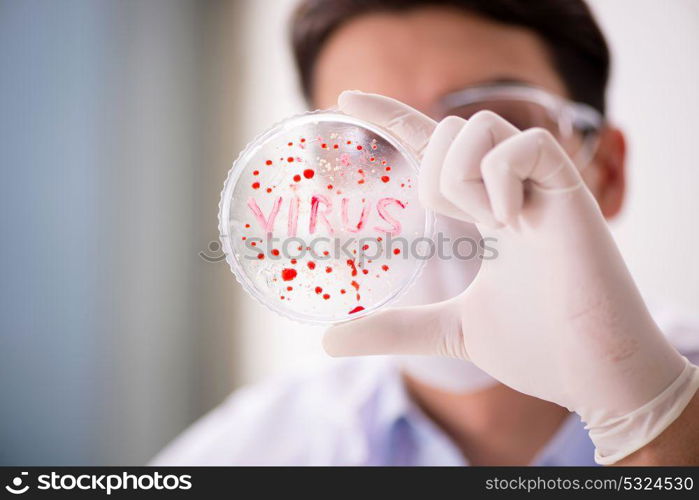 Male doctor working in the lab on virus vaccine