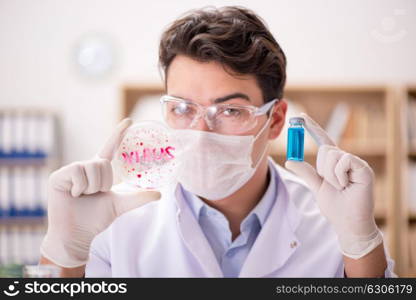 Male doctor working in the lab on virus vaccine