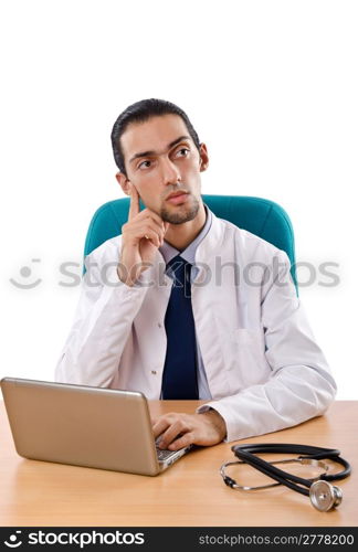 Male doctor working on laptop