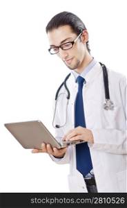 Male doctor working on laptop
