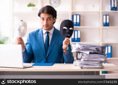 Male employee in the office in industrial espionage concept   