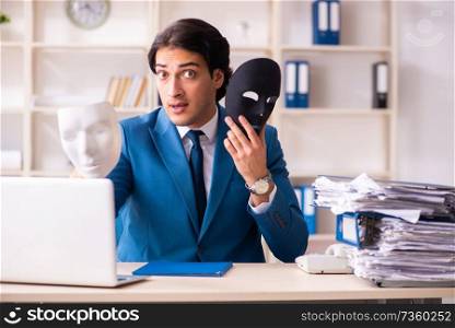 Male employee in the office in industrial espionage concept   