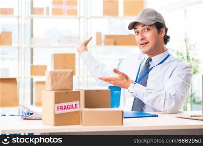 Male employee working in box delivery relocation service