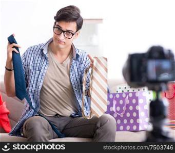 Male fashion blogger recording video for vlog. The male fashion blogger recording video for vlog