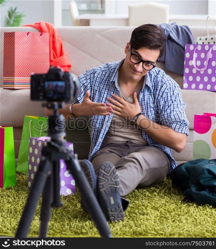 Male fashion blogger recording video for vlog. The male fashion blogger recording video for vlog