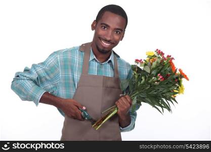 Male florist with a bunch of flowers
