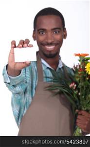 Male florist with business card
