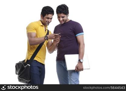Male friends using cell phone