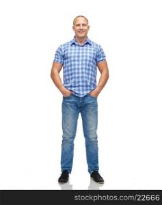 male, gender, fashion and people concept - smiling middle aged man in checkered shirt and jeans