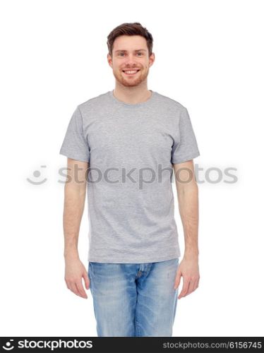 male, gender, fashion and people concept - smiling young man in gray t-shirt and jeans