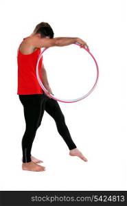 Male gymnast with hoops