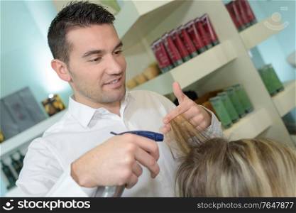 male hairdresser makes the cut for blonde girl male hairdresser