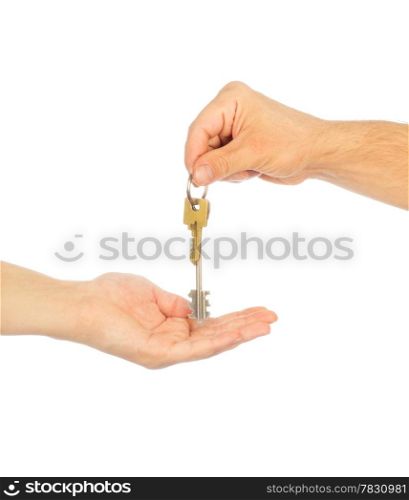 Male hand holding a car key and handing it over to another person isolated
