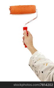 Male hand holding an orange paintroller over a white wall, ready to start painting