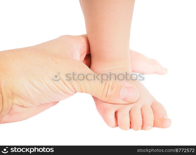 Male hand holding firmly around a foot of toddler isolated on white