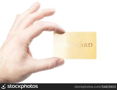male hand holding gold credit card isolated on white background