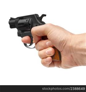 Male hand holding small black pistol, isolated on white background. Hand holding pistol