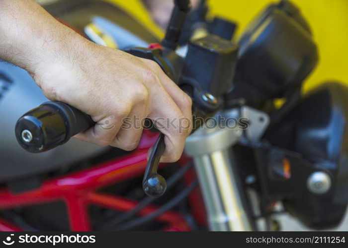 male hand motorcycle handle