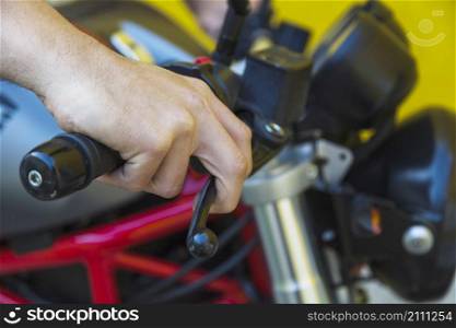 male hand motorcycle handle