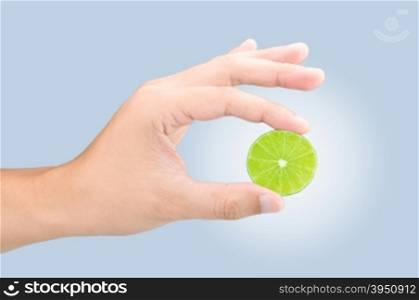 Male hand squeezing lime with clipping path&#xA;