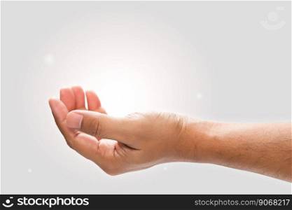 Male hand to hold something on a gray background.
