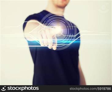 male hand touching virtual screen. close up of male hand touching virtual screen