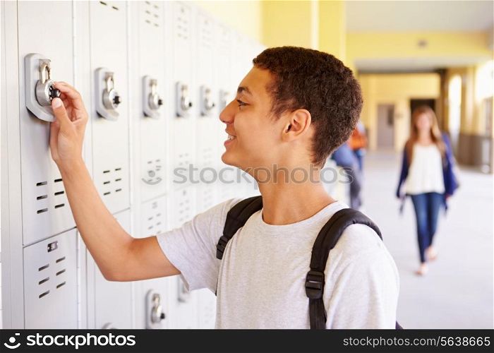 Male High School Student Opening Locker