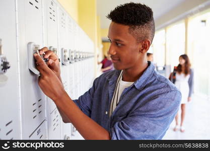 Male High School Student Opening Locker