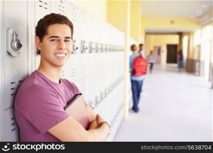 Male High School Student Standing By Lockers
