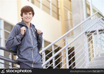 Male High School Student Standing Outside Building