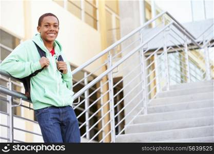 Male High School Student Standing Outside Building