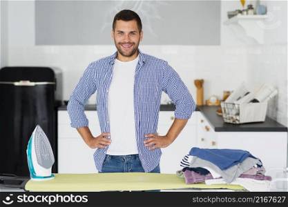 male home preparing iron clothes