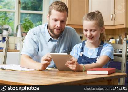 Male Home Tutor Helping Girl With Studies