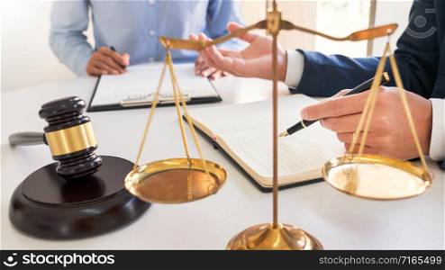Male lawyer or judge consult with client check contract papers recommend legal proposals, Law services concept.