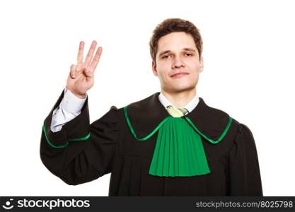 Male lawyer show sign with hand.. Understanding and explaining sending clear message. Young lawyer wear polish toga and show hand sign. Man make gesture hold three fingers in air.