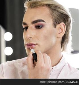 male make up look using lipstick