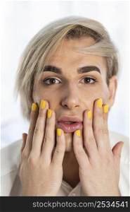 male make up look yellow nails