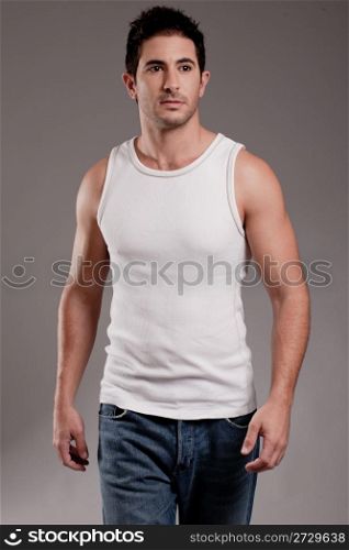 Male model half length shot on a grey background