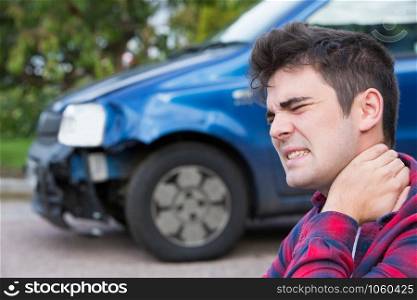 Male Motorist Suffering From Whiplash After Car Accident
