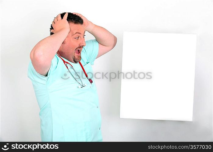 Male nurse shocked with white panel for message