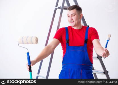 Male painter preparing for painting job at construction site