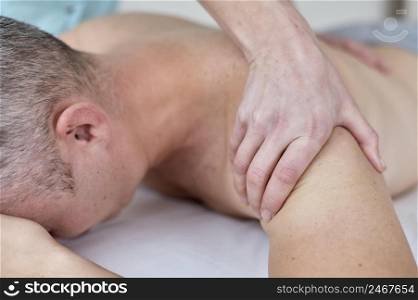 male patient undergoing therapy with physiologist 3