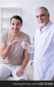 Male patient visitng doctor for shot inoculation 