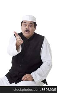 Male politician gesturing over white background